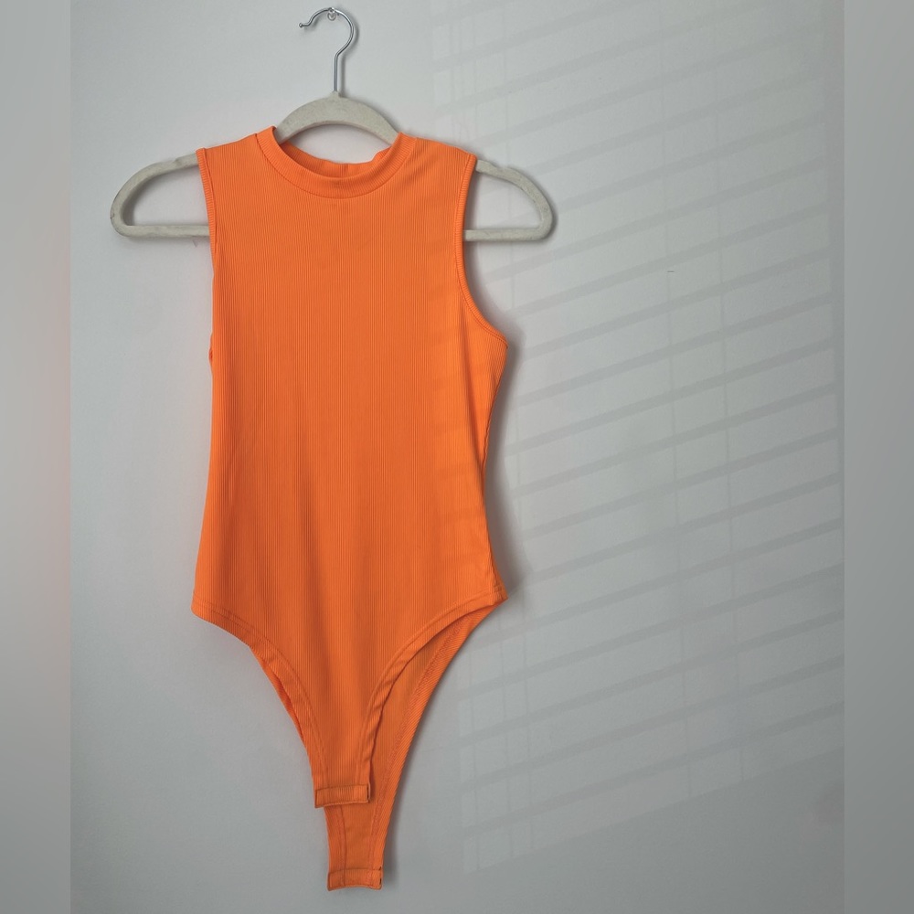 Never Worn Orange bodysuit